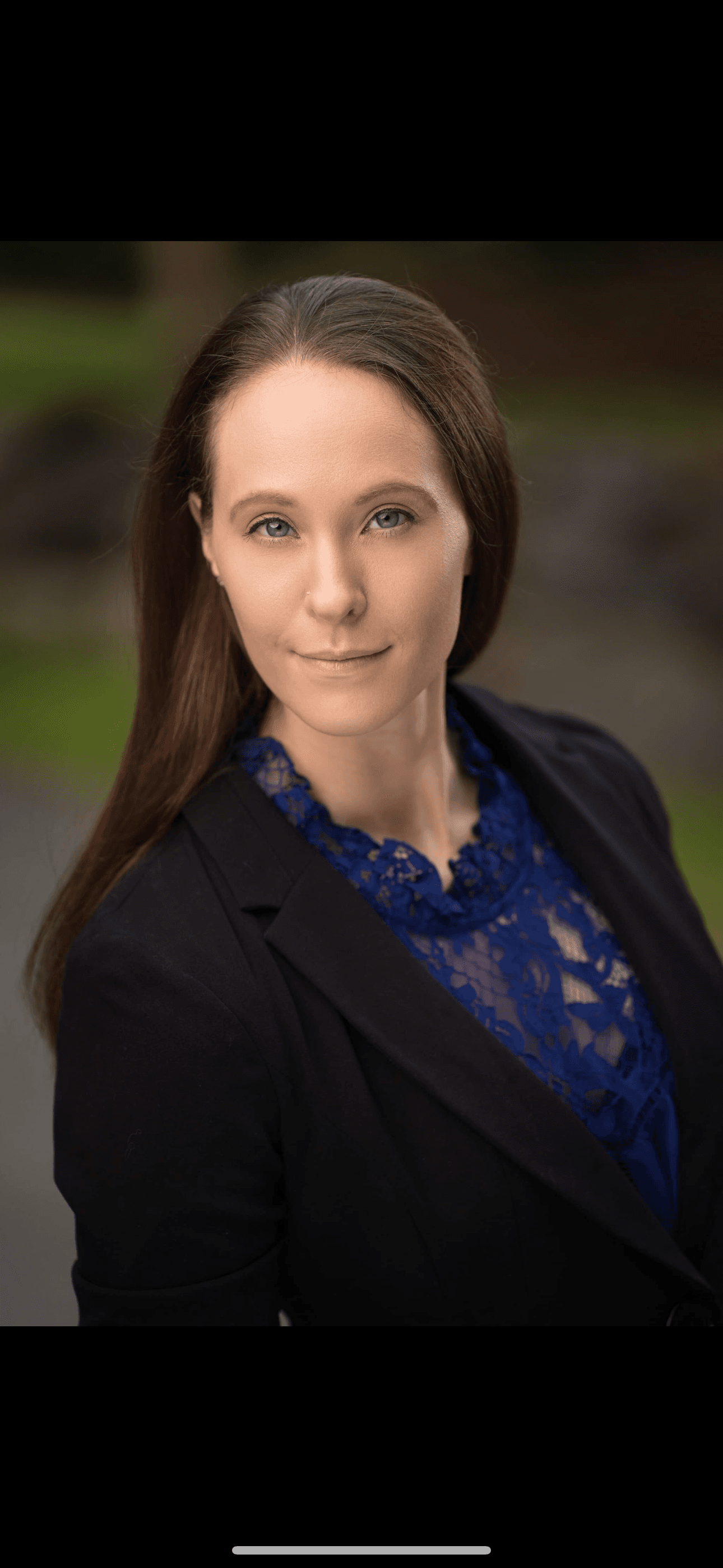 Andrea Abella Marie, lifestyle coach serving Derry, New Hampshire, in an outdoor portrait